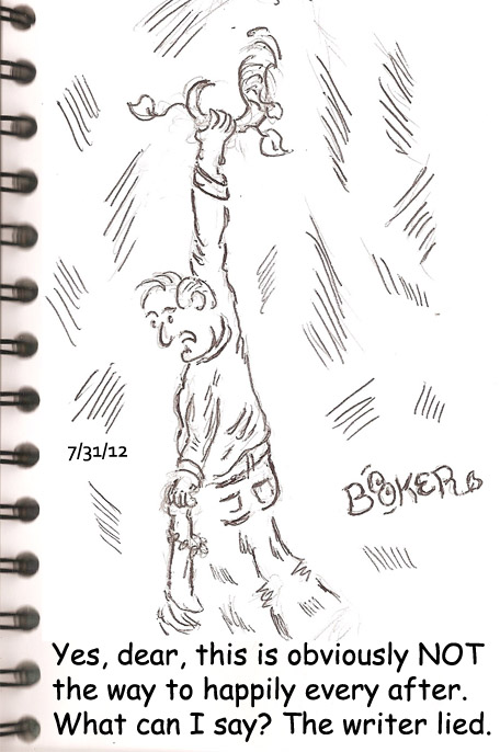 Man hanging from side of cliff