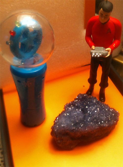 Well, Captain, she's either the biggest lump of coal Santa ever brought, or one of the largest dilithium crystal piles I've ever seem. Would explain what powers those eight tiny reindeer.