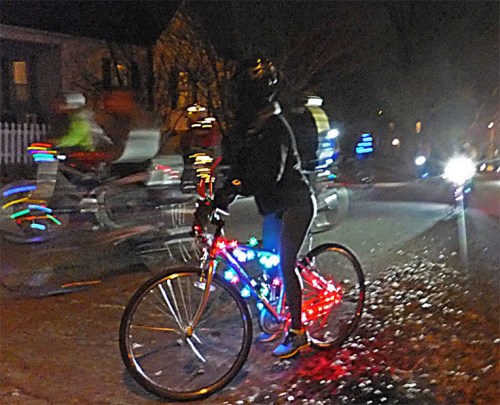 Riding a bike at night, with over a thousand friends.